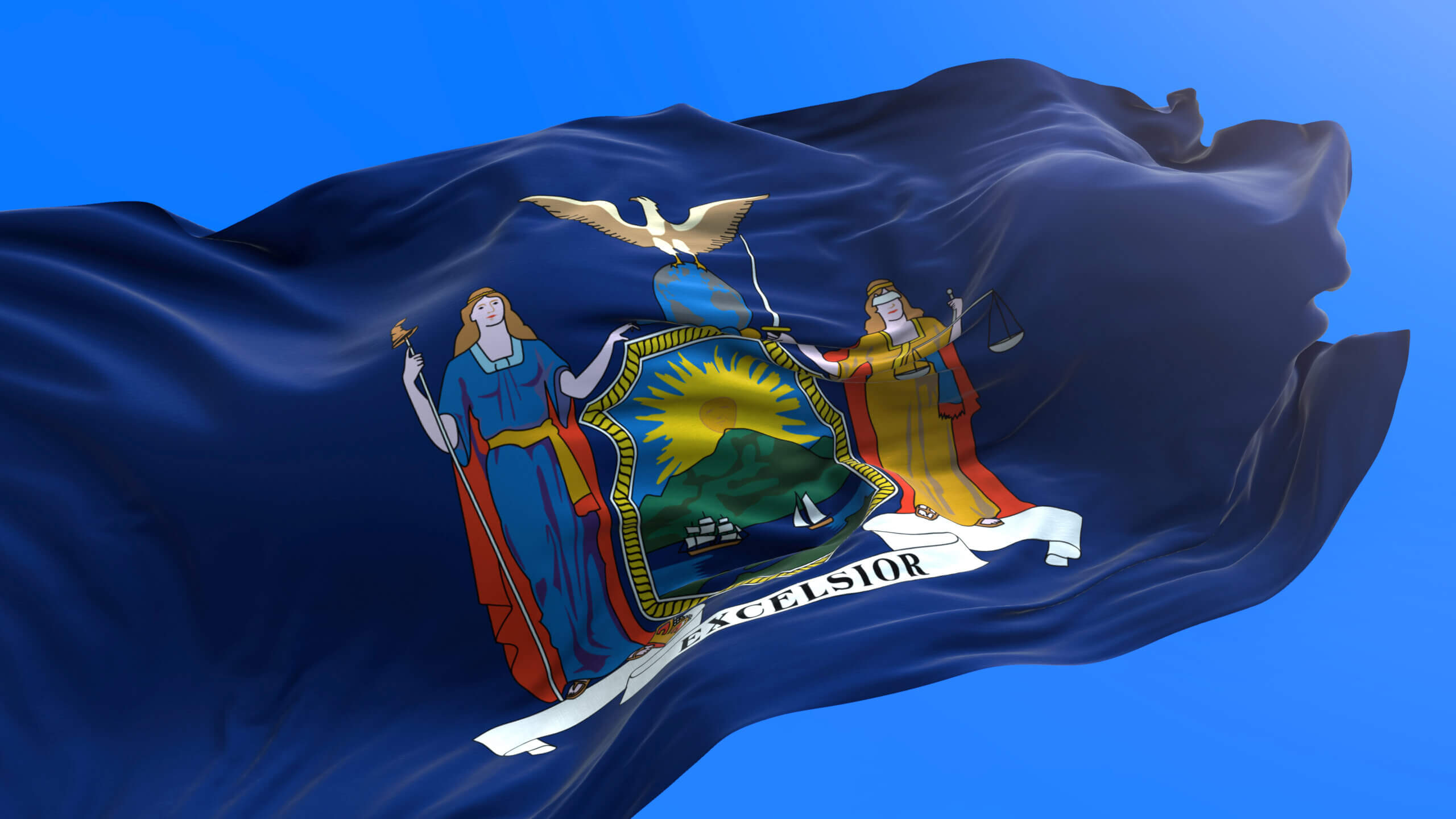 The image features the New York State flag waving against a clear blue sky. The flag displays the state coat of arms, which includes two figures, a shield with a landscape, and an eagle perched on the globe.
