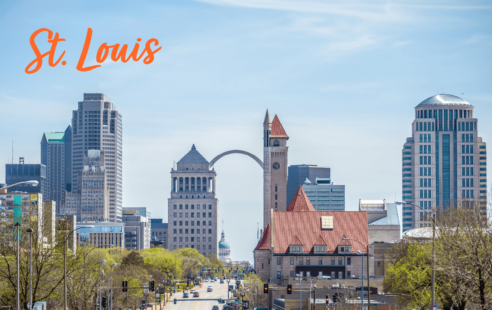 Downtown St. Louis cityscape with the Gateway Arch, tall buildings, Union Station, and "St. Louis" in orange script in the sky—an inviting backdrop for a business law conference or upcoming legal conferences 2025. Trees and cars line the street below on a clear day.